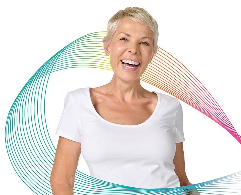 Women smiling Colgate Total